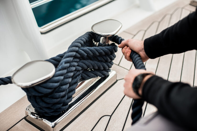 hands tying a sailing knot on a yacht in Croatia