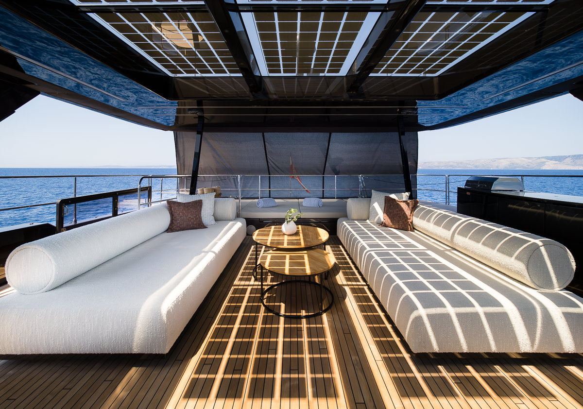 Amber One luxury catamaran - covered upper deck big lounge area.
