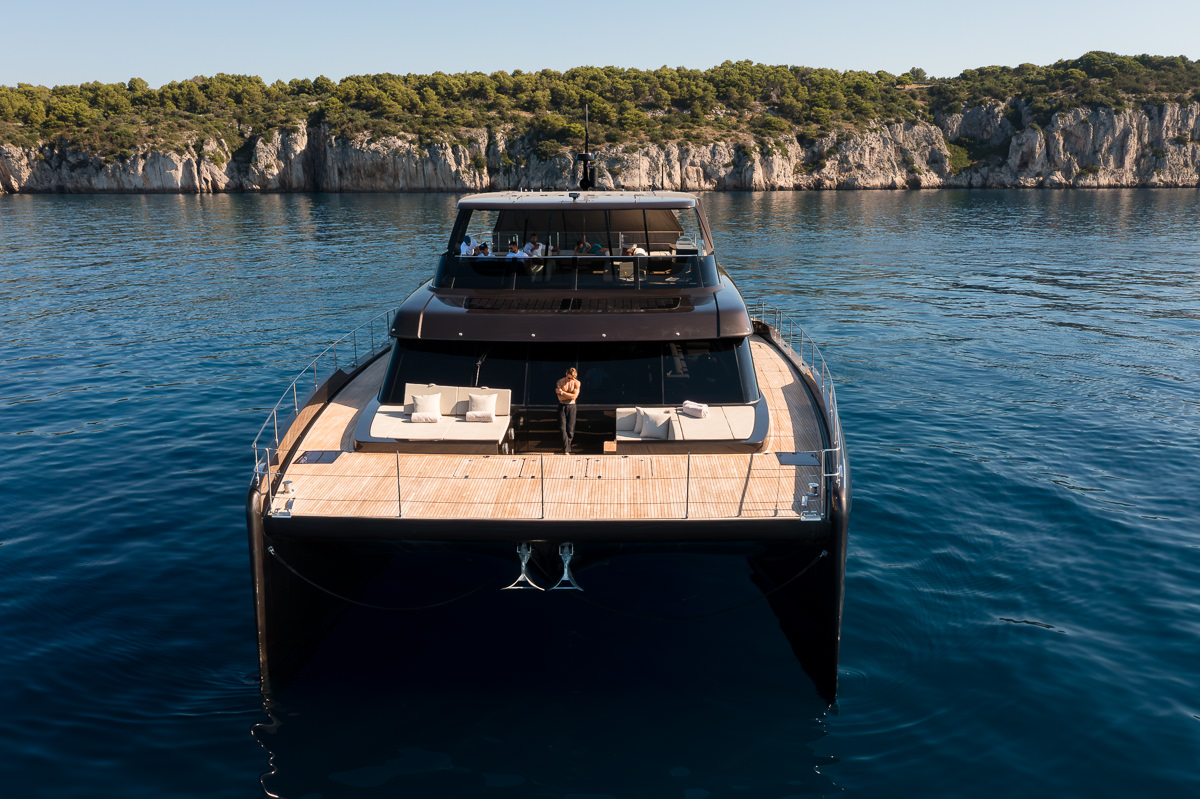 Amber One luxury catamaran - front view of an anchored yacht in the Adriatic Sea near Croatia's coast.