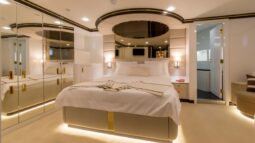 Aurum Sky sailing yacht - cabin with a double bed, ensuite bathroom and a big sofa.