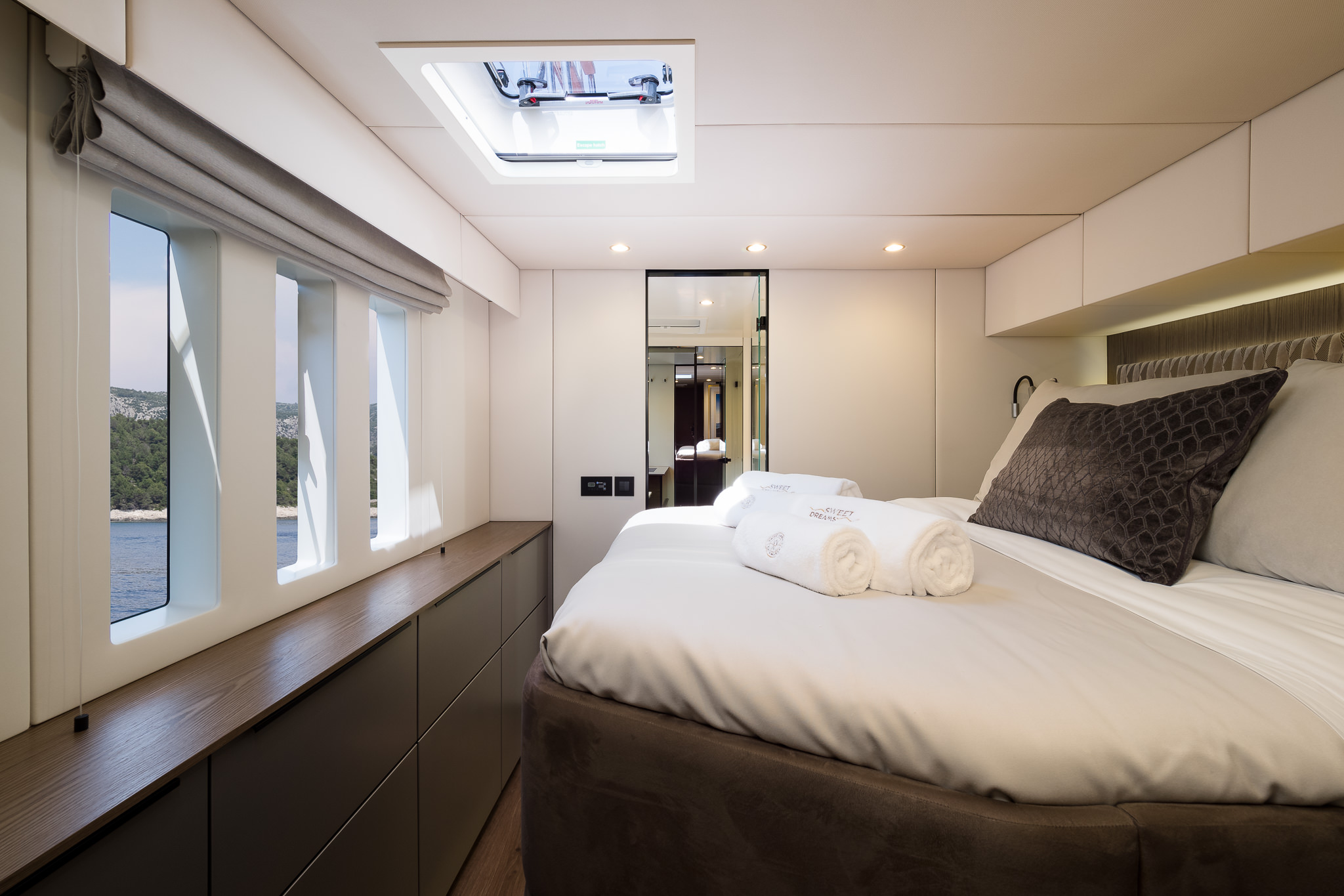 Sweet Dreams luxury yacht - cabins with a double bed, ensuite bathroom, 3 big windows, and a roof porthole.