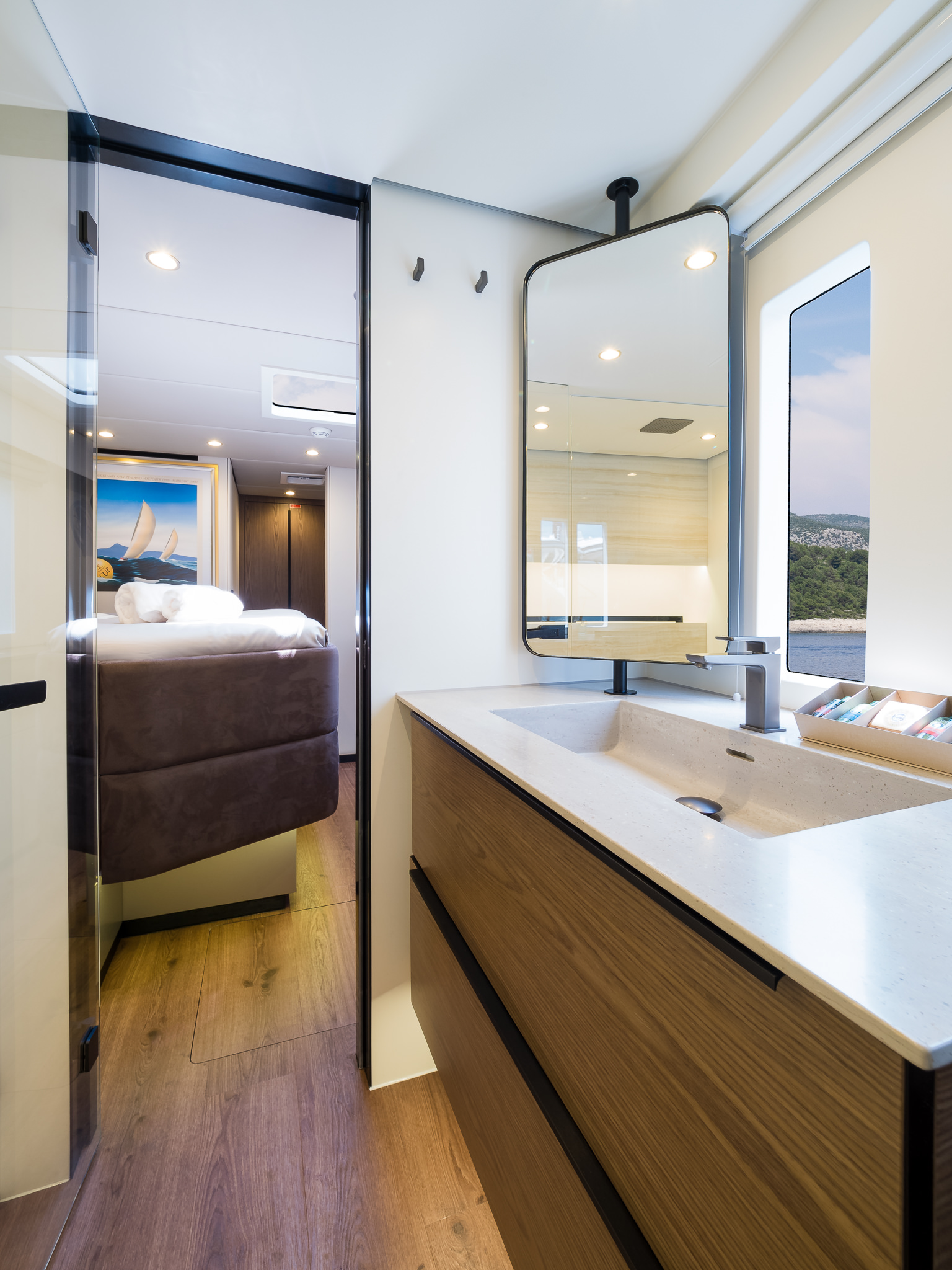 Sweet Dreams luxury yacht - bathroom with a big window in one of the cabins.