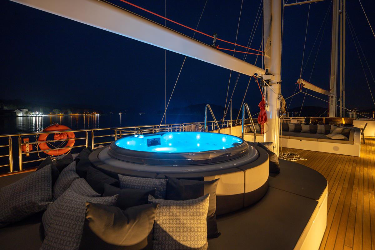 Love Story's luxurious sailing yacht upper deck - jacuzzi with lounge area.