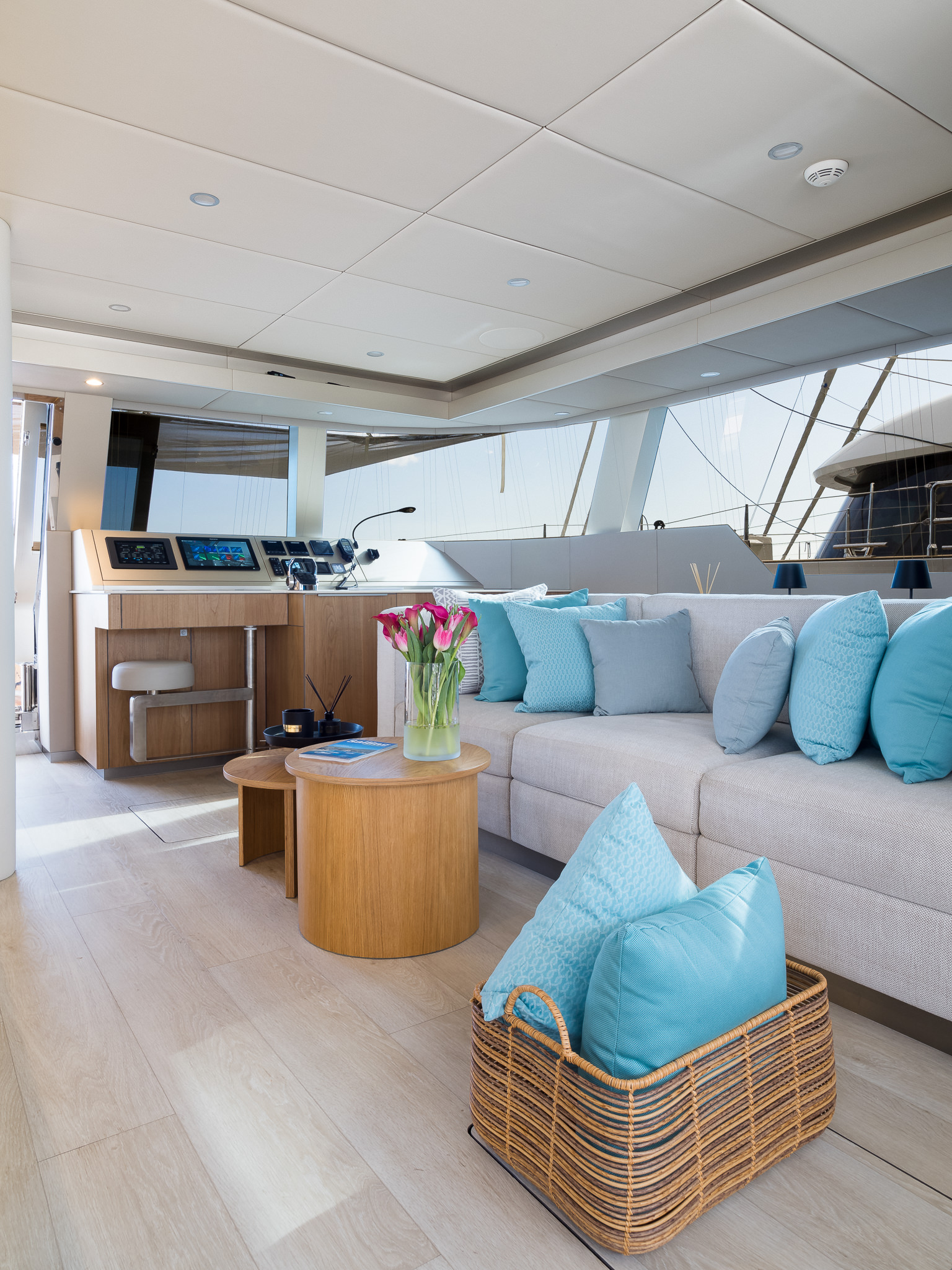 Sunreef 50 ZARA luxury catamaran interior lounge area with club table near the command bridge