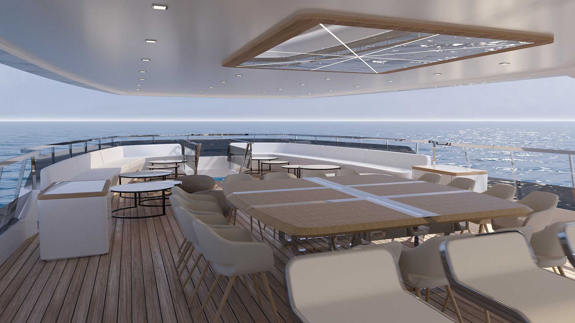 Argo luxury yacht - covered deck with lounge area and a big dining table.